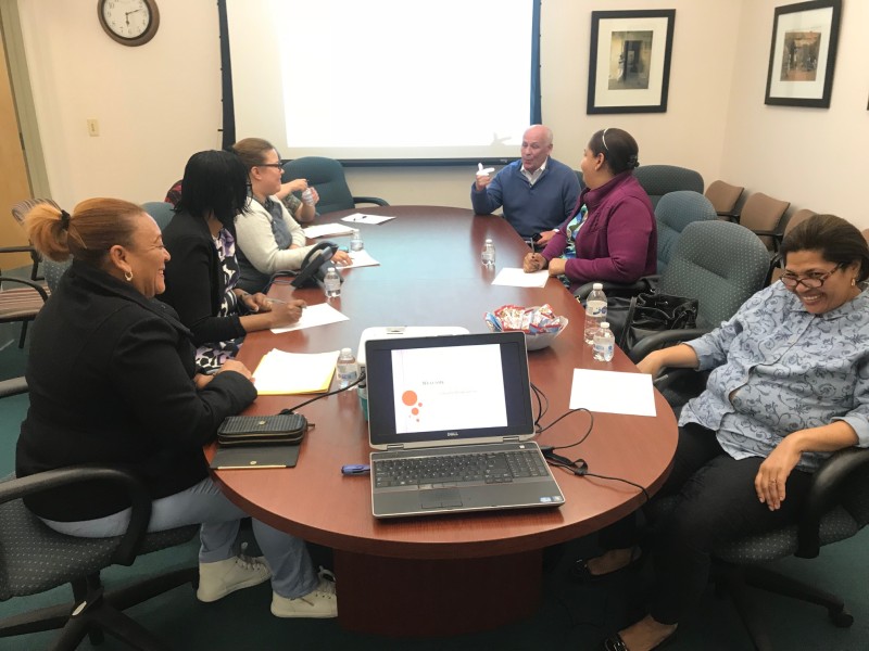 Group of people around a conference table